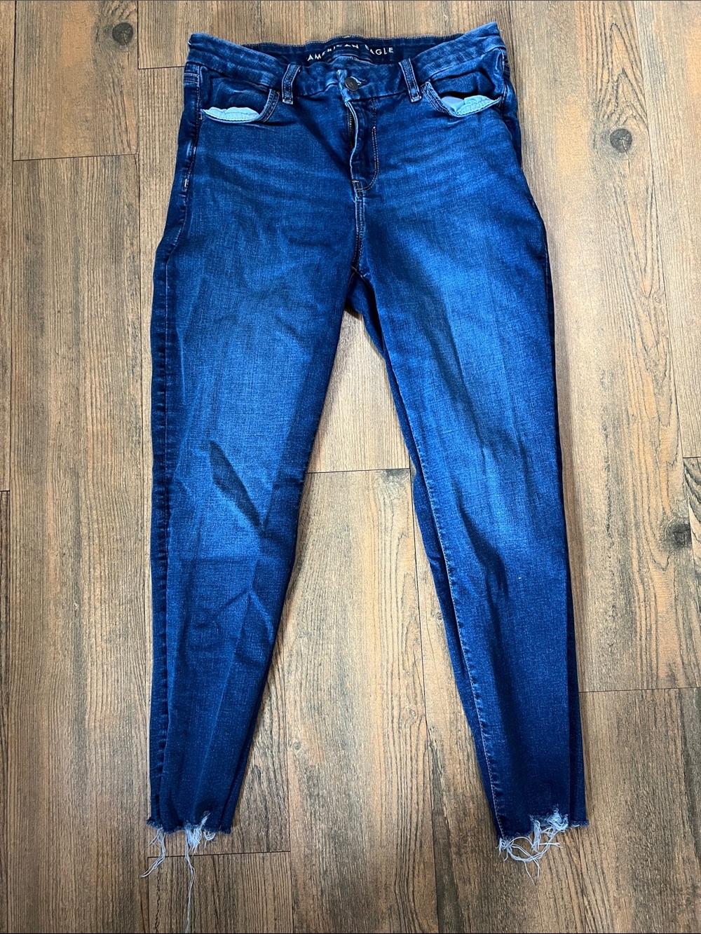 American Eagle Outfitters Deep Indigo Skinny Jeans with Frayed Hem